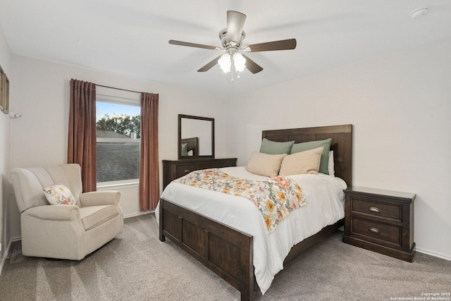 bedroom featuring ceiling fan and carpet flooring