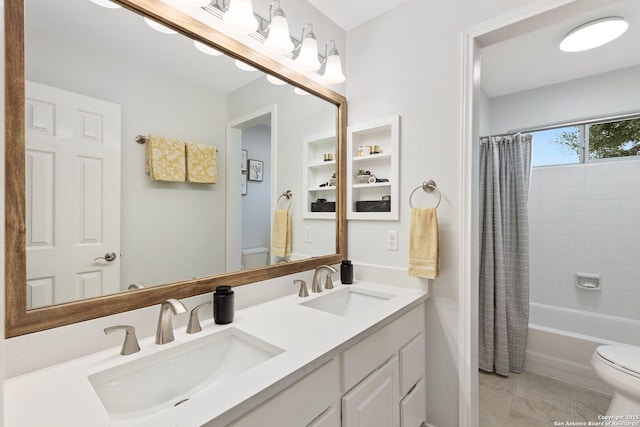 full bathroom featuring shower / tub combo, a sink, toilet, and double vanity