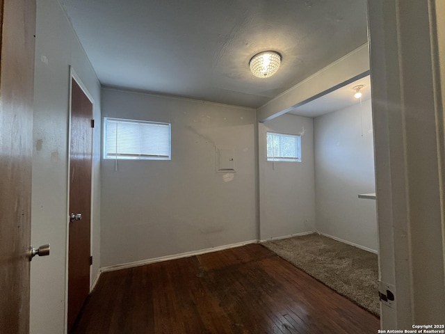 unfurnished room featuring wood-type flooring