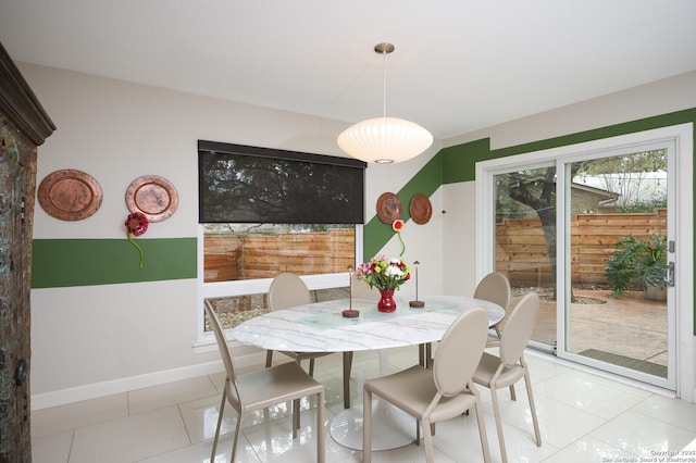 dining room with light tile patterned flooring