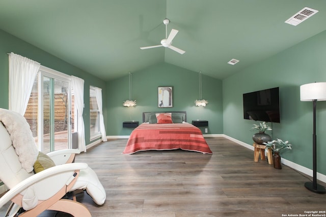 bedroom featuring ceiling fan, wood-type flooring, and vaulted ceiling