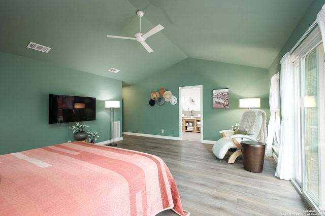 bedroom featuring ceiling fan, wood-type flooring, and vaulted ceiling