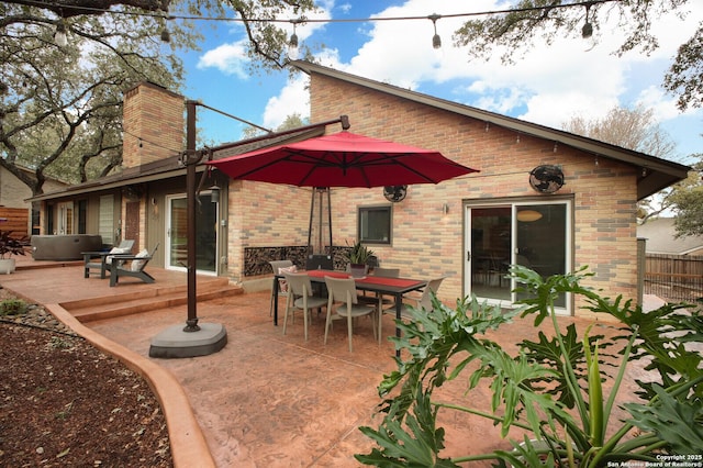 rear view of property with a patio