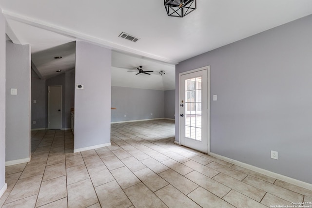 unfurnished room with ceiling fan, light tile patterned floors, and lofted ceiling