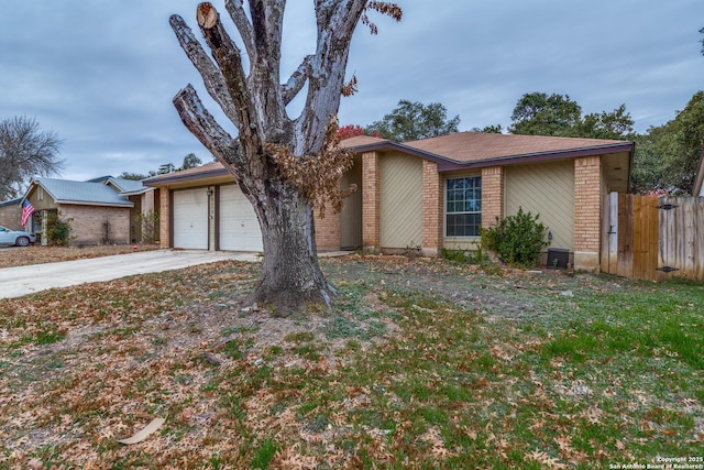 ranch-style house featuring a garage