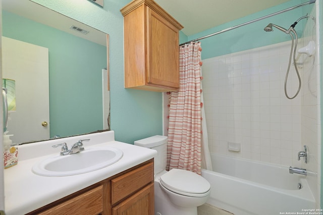 full bathroom with toilet, vanity, and shower / bath combination with curtain