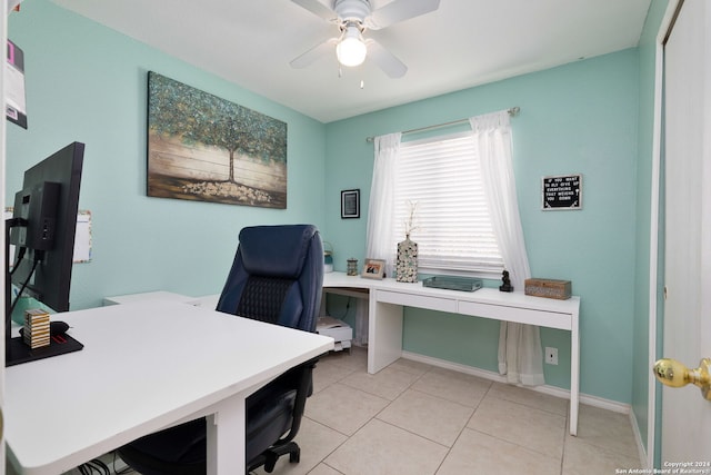 office space with ceiling fan and light tile patterned floors