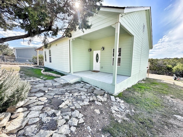 view of front facade featuring a patio area