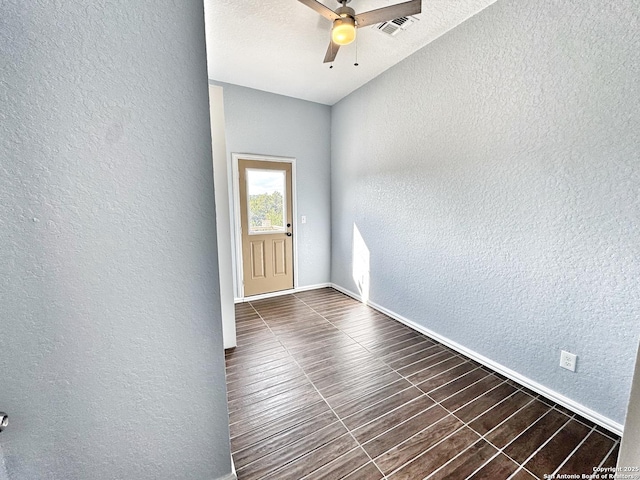 spare room with ceiling fan