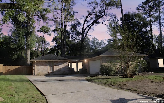 ranch-style home with a garage