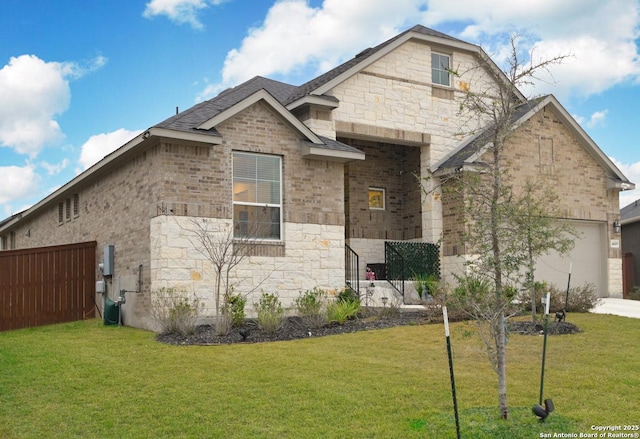 view of front of house with a garage and a front lawn