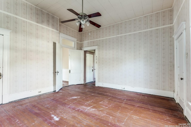 unfurnished bedroom with ceiling fan and wood-type flooring