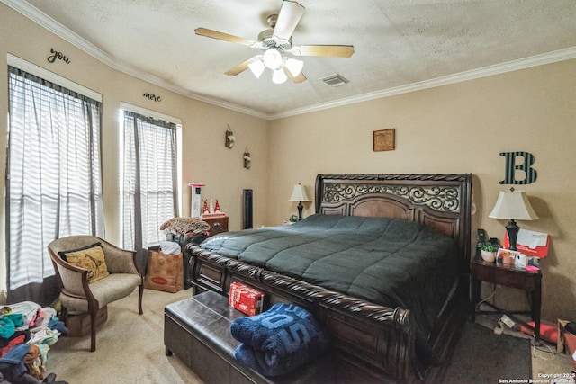 bedroom with a textured ceiling, ornamental molding, light colored carpet, and ceiling fan