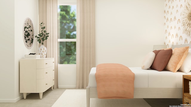 bedroom with light colored carpet