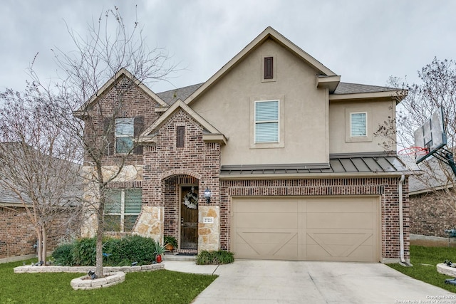 view of front of home with a garage