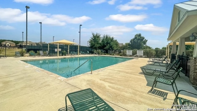 view of pool with a patio