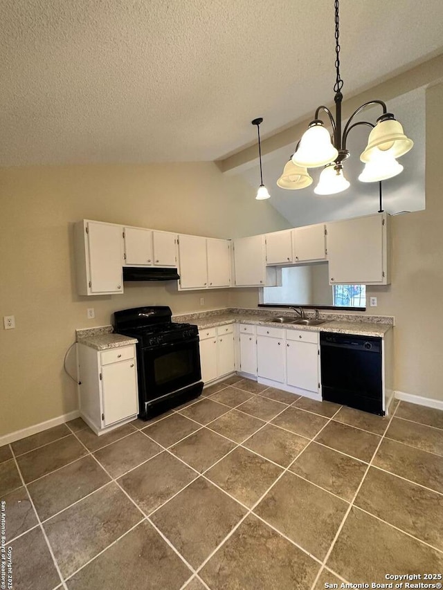 kitchen featuring white cabinetry, sink, dark tile patterned flooring, hanging light fixtures, and black appliances