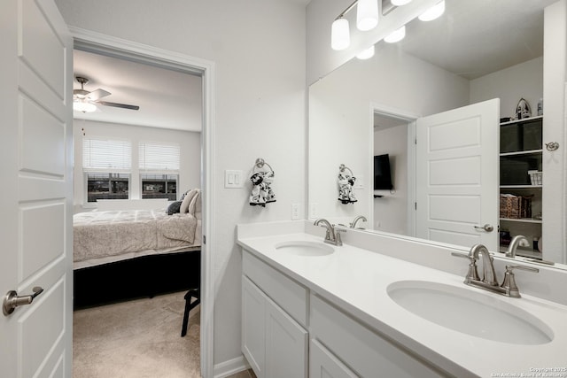 bathroom featuring ceiling fan and vanity