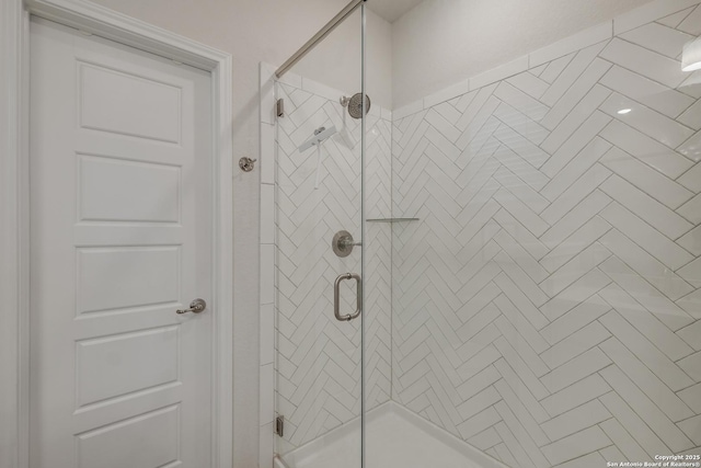 bathroom with an enclosed shower