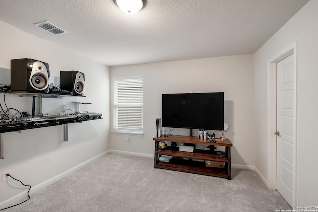 interior space with a textured ceiling