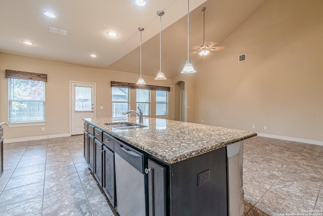 kitchen with dishwasher, hanging light fixtures, sink, light stone counters, and a center island with sink