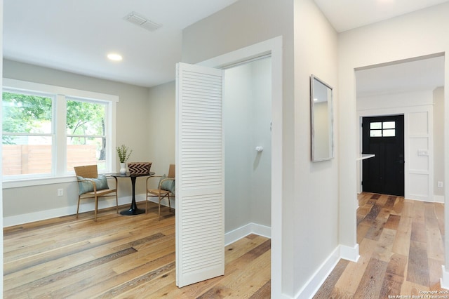 hall featuring light hardwood / wood-style floors