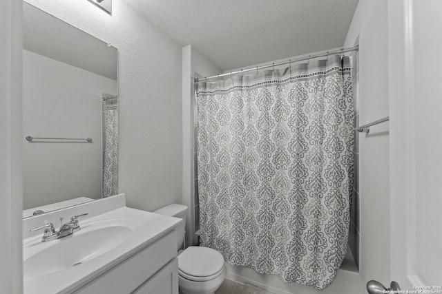 full bathroom featuring toilet, a textured ceiling, shower / bath combination with curtain, and vanity