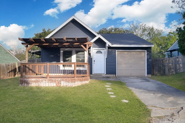 view of front facade with a garage and a front lawn