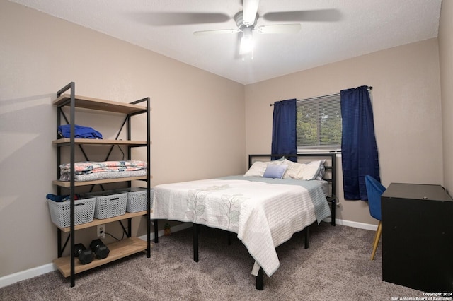 bedroom with ceiling fan and carpet flooring