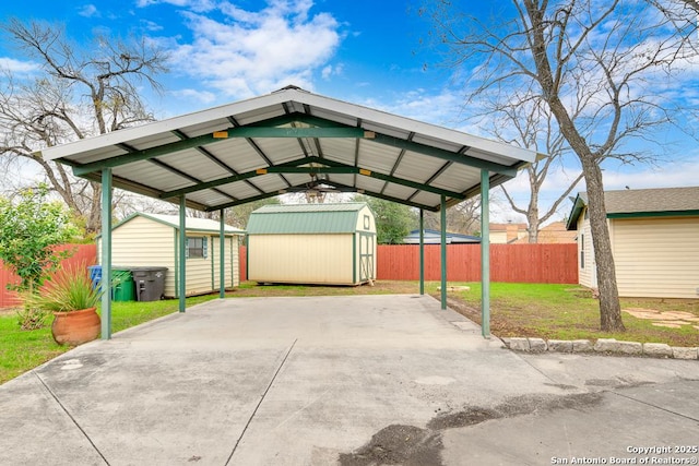 view of car parking with a yard and a carport