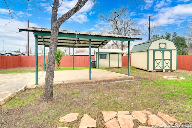 exterior space featuring a carport and a storage shed