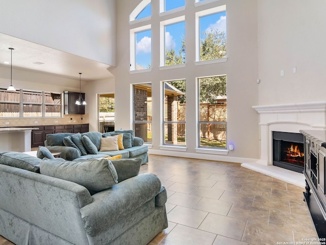 living room featuring a high ceiling