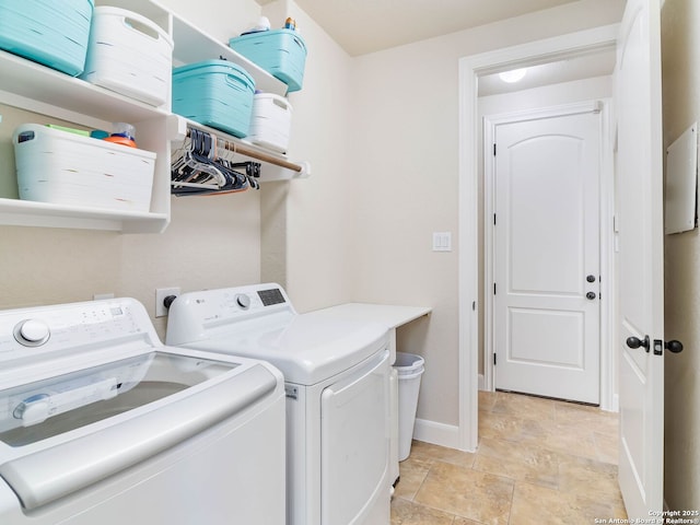 laundry room with washer and dryer