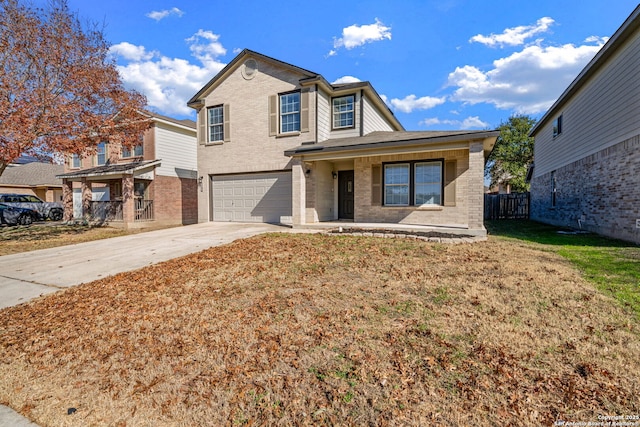 view of front property with a front yard and a garage