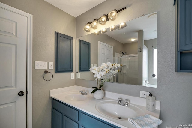 bathroom featuring walk in shower and vanity