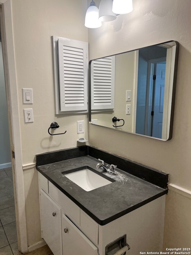 bathroom with vanity and tile patterned floors