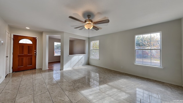 entryway featuring ceiling fan