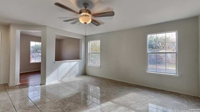 empty room featuring ceiling fan