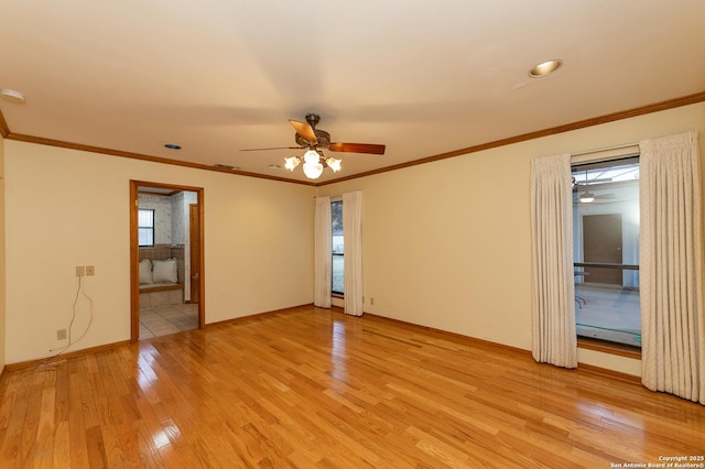 unfurnished room with crown molding, light wood-type flooring, and ceiling fan