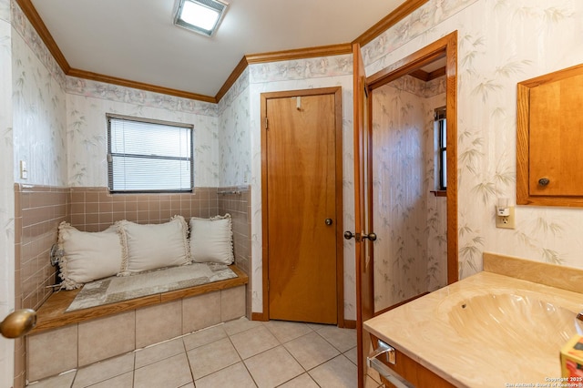 bathroom featuring vanity, ornamental molding, and tile patterned flooring