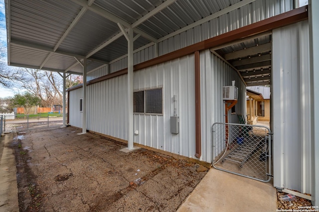 view of horse barn featuring an AC wall unit