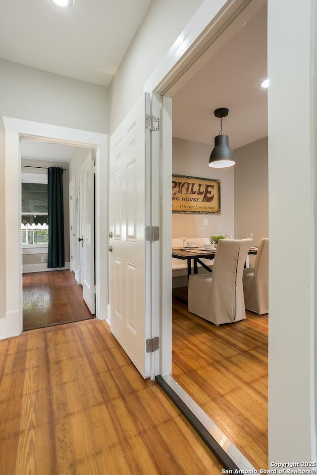 hallway featuring hardwood / wood-style flooring