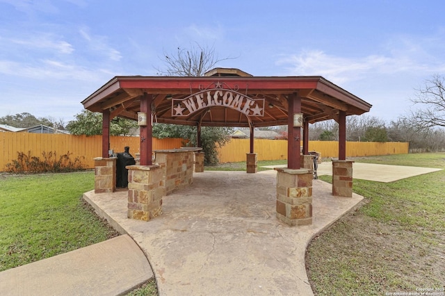 view of patio / terrace with a bar and a gazebo