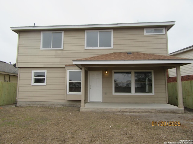 rear view of property featuring a patio area