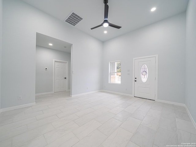 unfurnished room featuring ceiling fan