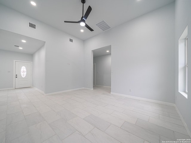 spare room with ceiling fan