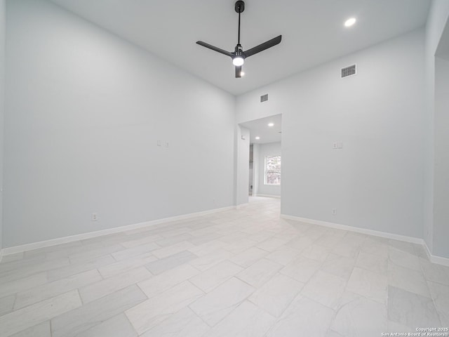 spare room featuring ceiling fan