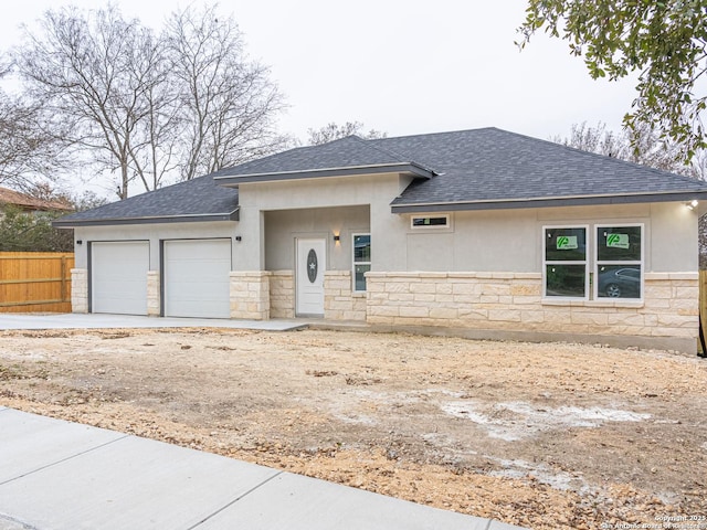 prairie-style home with a garage