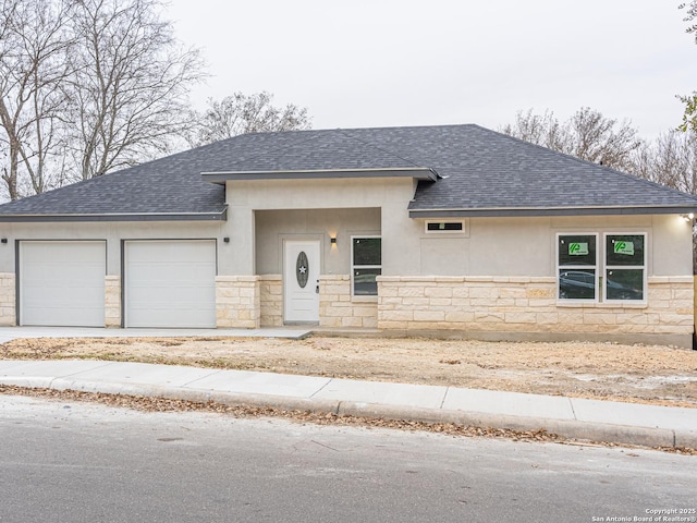 view of front of home with a garage