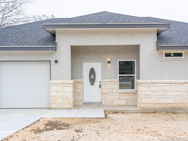 entrance to property with a garage